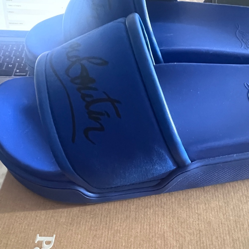 Christian Louboutin pool slides. Size 40